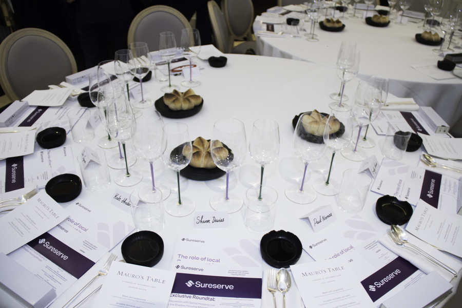Roundtable with leaflets and bread on.