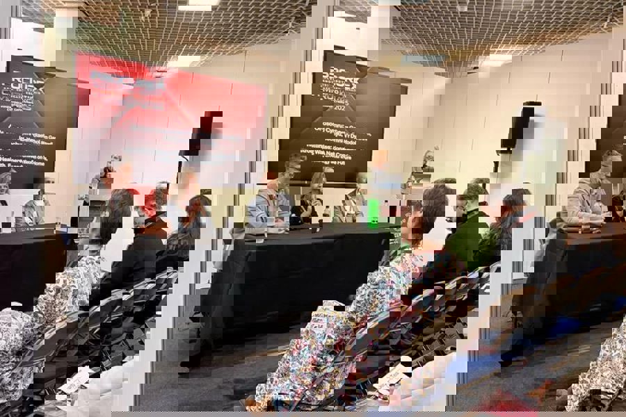 Speakers sat at table 