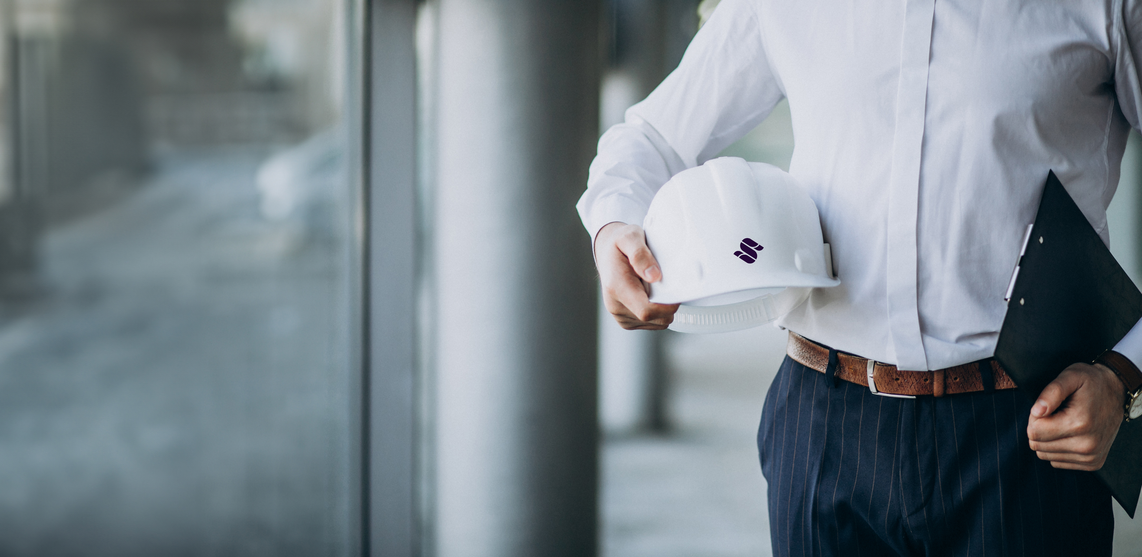 Man in suit with hard hat