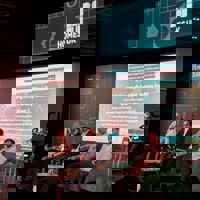 Speakers sat at table 