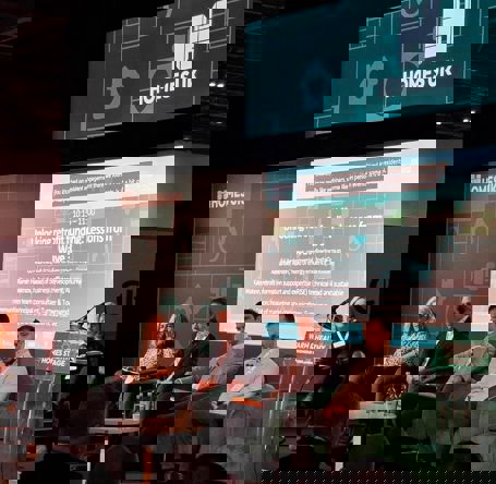 Speakers sat at table 